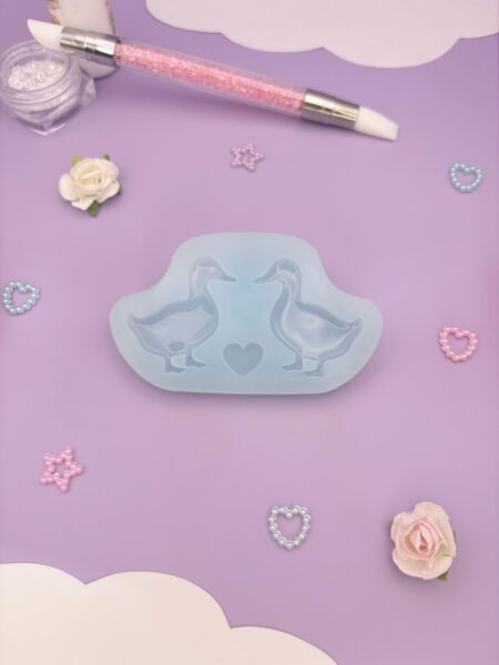 Moule en silicone boucles d'oreilles canards pour résine époxy.
