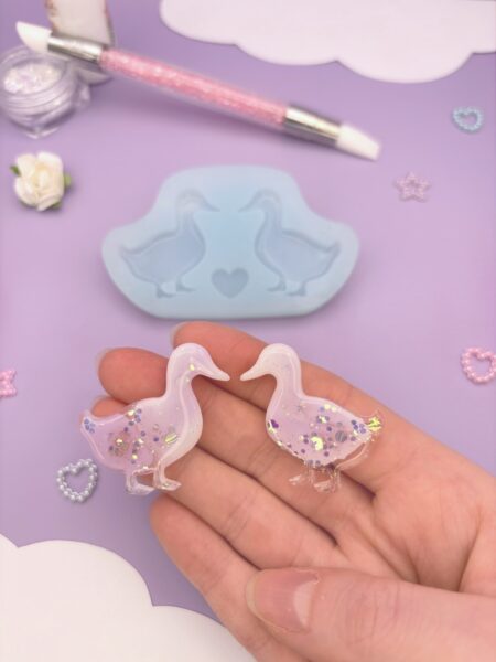 Moule en silicone boucles d'oreilles canards pour résine époxy.